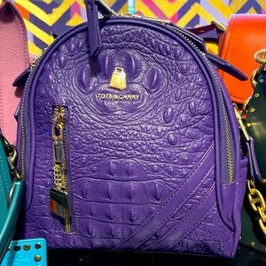 Tote and carry mini backpack